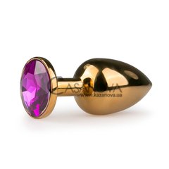 Основное фото Анальная пробка EasyToys Metal Butt Plug золотистая с фиолетовым камнем 7,2 см