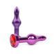 Дополнительное фото Анальная пробка Anal Jewelry Plugs фиолетовая с красным кристаллом 10,3 см