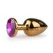 Дополнительное фото Анальная пробка EasyToys Metal Butt Plug золотистая с фиолетовым камнем 7,2 см