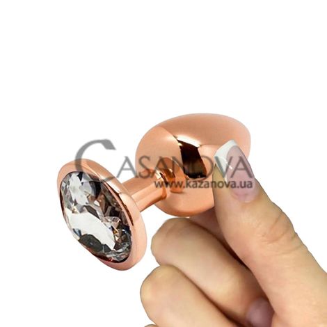 Основное фото Анальная пробка Wooomy Tralalo S золотистая с прозрачным кристаллом 7 см